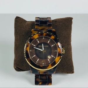 Michael Kora tortoise shell and gold watch
